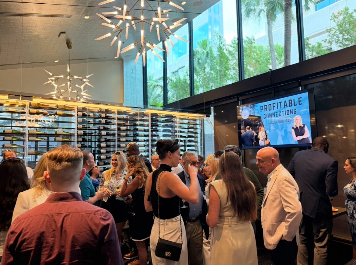 Attendees making connections at a Profitable Connections mixer